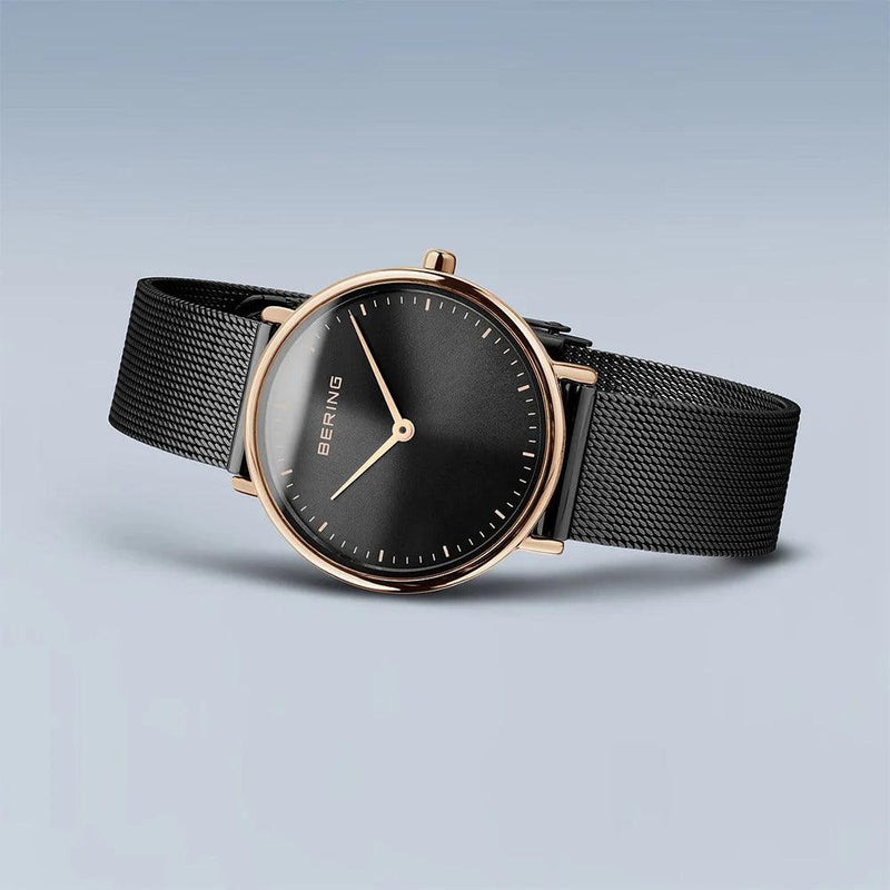 Bering Ultra Slim 15729-166 analog damklocka med svart urtavla och armband i rostfritt stål