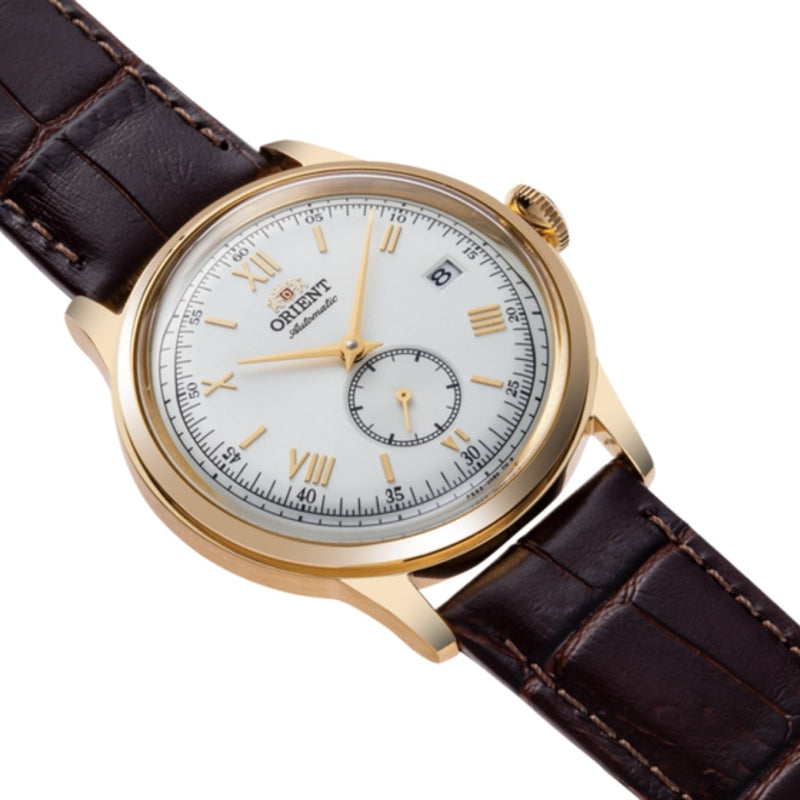 Orient Bambino RA-AP0106S30B analog herrklocka med vit urtavla och armband i läder