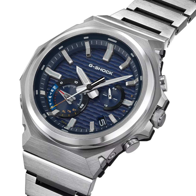 Casio G-Shock GST-B1000D-2AER analog herrklocka med blå urtavla och armband i rostfritt stål