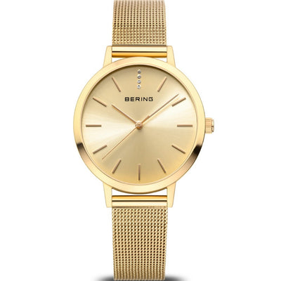 Bering Classic polished gold 13434-333 analog damklocka med guld urtavla och armband i rostfritt stål