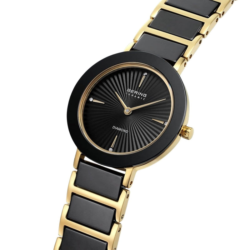 Bering Ceramic 11429-732 analog damklocka med svart urtavla och armband i rostfritt stål
