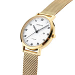 Bering Titanium 18634-334 analog damklocka med vit urtavla och armband i rostfritt stål
