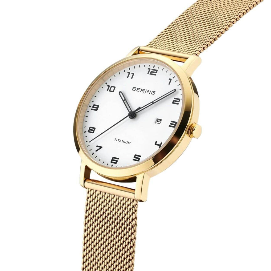 Bering Titanium 18634-334 analog damklocka med vit urtavla och armband i rostfritt stål