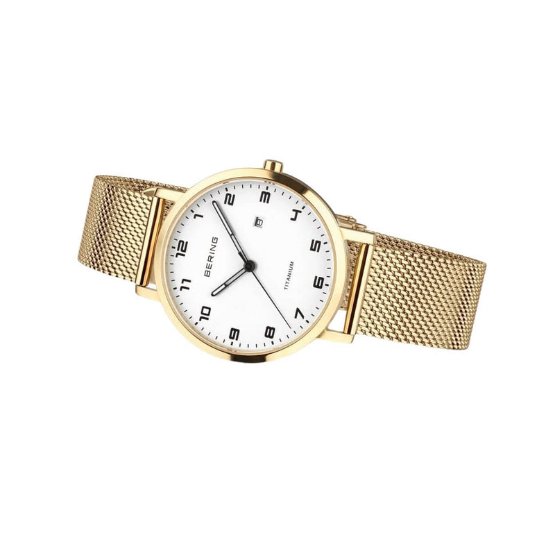 Bering Titanium 18634-334 analog damklocka med vit urtavla och armband i rostfritt stål