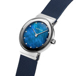 Bering Classic 10126-307 analog damklocka med blå urtavla och armband i mesh