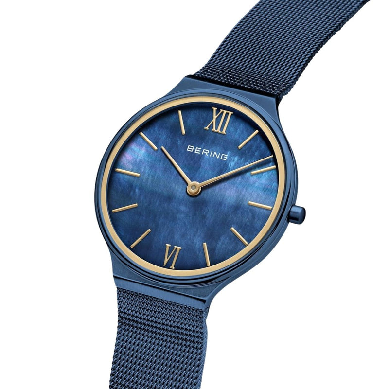 Bering Ultra Slim 18434-397 analog damklocka med blå urtavla och armband i rostfritt stål